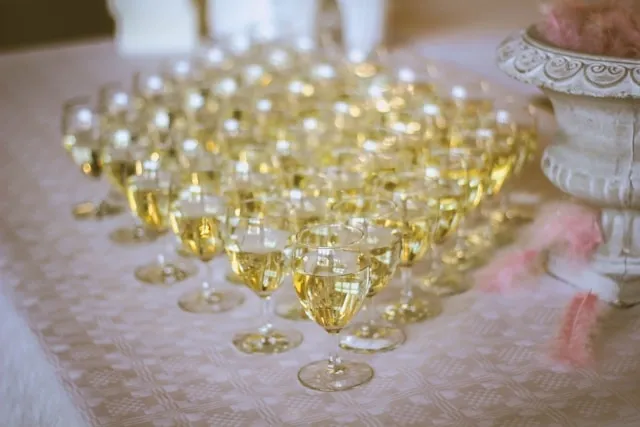 a sophisticated beverage table at an event for gala event planning checklist