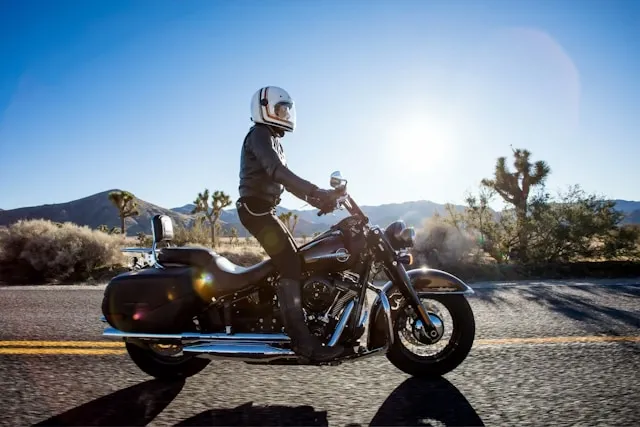 a person riding their motorcycle through the desert for gifts for motorcycle riders