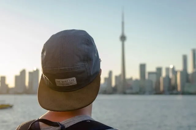 a person wearing a hat with a patch for how to apply a patch with a hat heat press