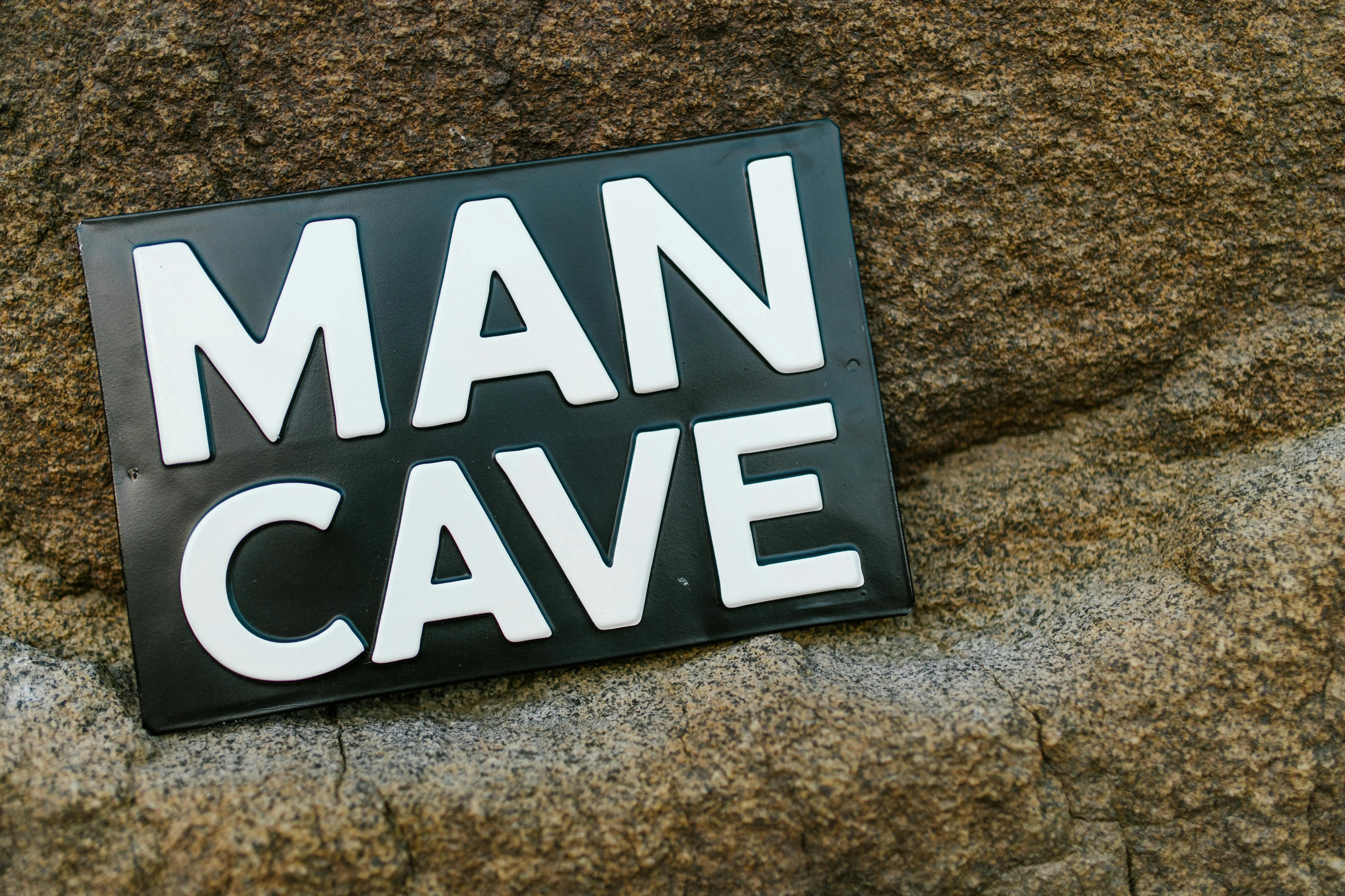 a sign that reads man cave for man cave furniture ideas