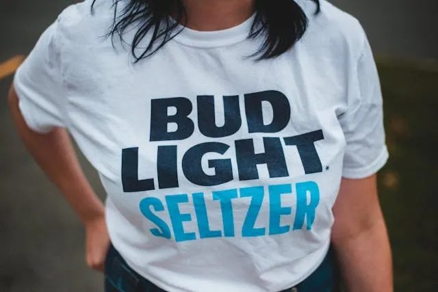 close up photo of a white t-shirt with lettering for how to take off iron on letters