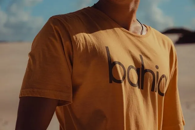 close up of a person wearing a t-shirt with lettering for how to take off iron on letters