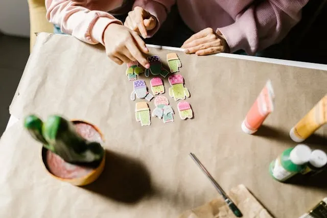 a top view of people preparing patches for best fabric glue for patches