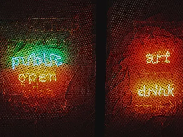 colorful neon signs in a shop window for when were neon lights invented