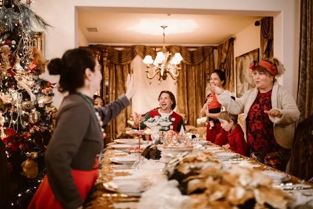 people around a table for a festive meal for event table decoration ideas