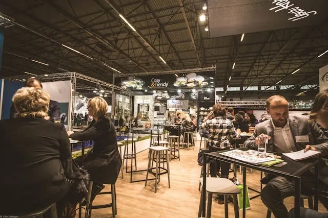 people networking around tables for how many cocktail tables for 100 guests