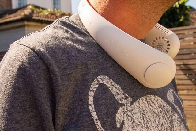 a man wearing a portable neck fan for best neck fan