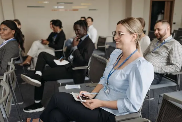 smiling people sitting in chairs for name tag ideas smiling people sitting in chairs for name tag ideas