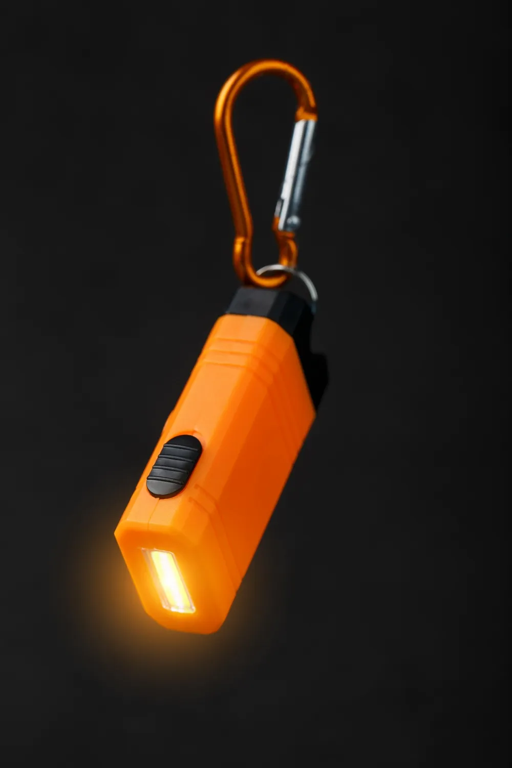 Orange led flashlight keychains black background customkeychains